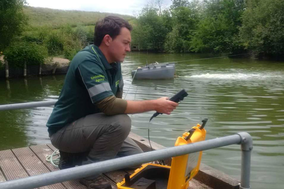 Stuart Manwaring checking oxygen levels at Ladygrove Lakes, Didcot