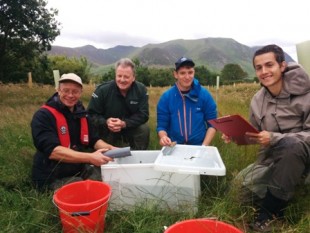 Ian Creighton (West Cumbria Rivers Trust), Mike Farrell (Environment Agency) and students from Aberystwyth University carrying out a fish survey on Whitbeck in the Lorton Valley