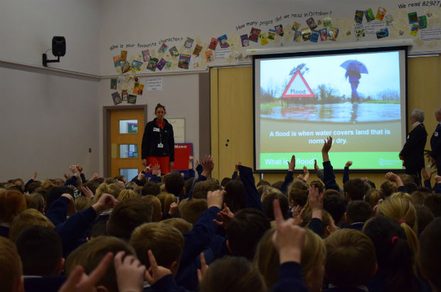 Engagement Officer Taryn in a classroom educating kids about flooding