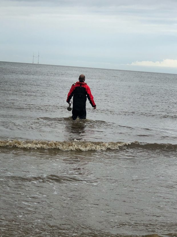 an image of a man in bathing water