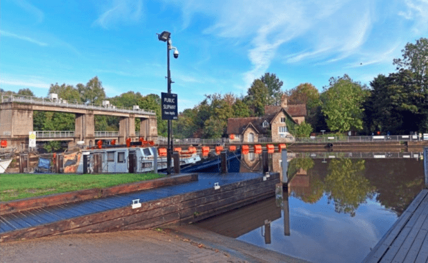 Allington Lock and lock keepers cottage. Boat and slipway in foreground.