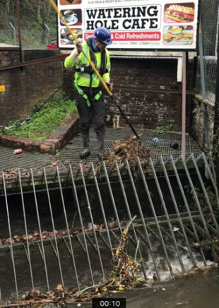 Radio operated camera captures Environment Agency officer clearing the offending weed after spotting it remotely from the camera.