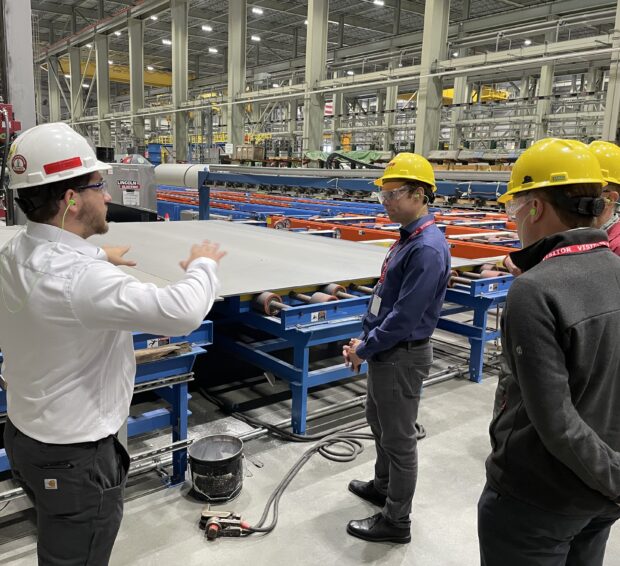 EA employee Andy Pynn talking to Holtec employee in a nuclear manufacturing centre