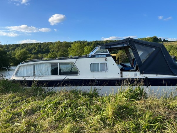 Jon's boat moored on the River Thames.