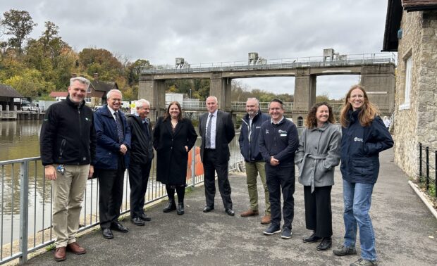 EA Chair Alan Lovell and staff from the Canal and Rivers Trust pose for a photo in front of Allington Lock, River Medway, Kent
